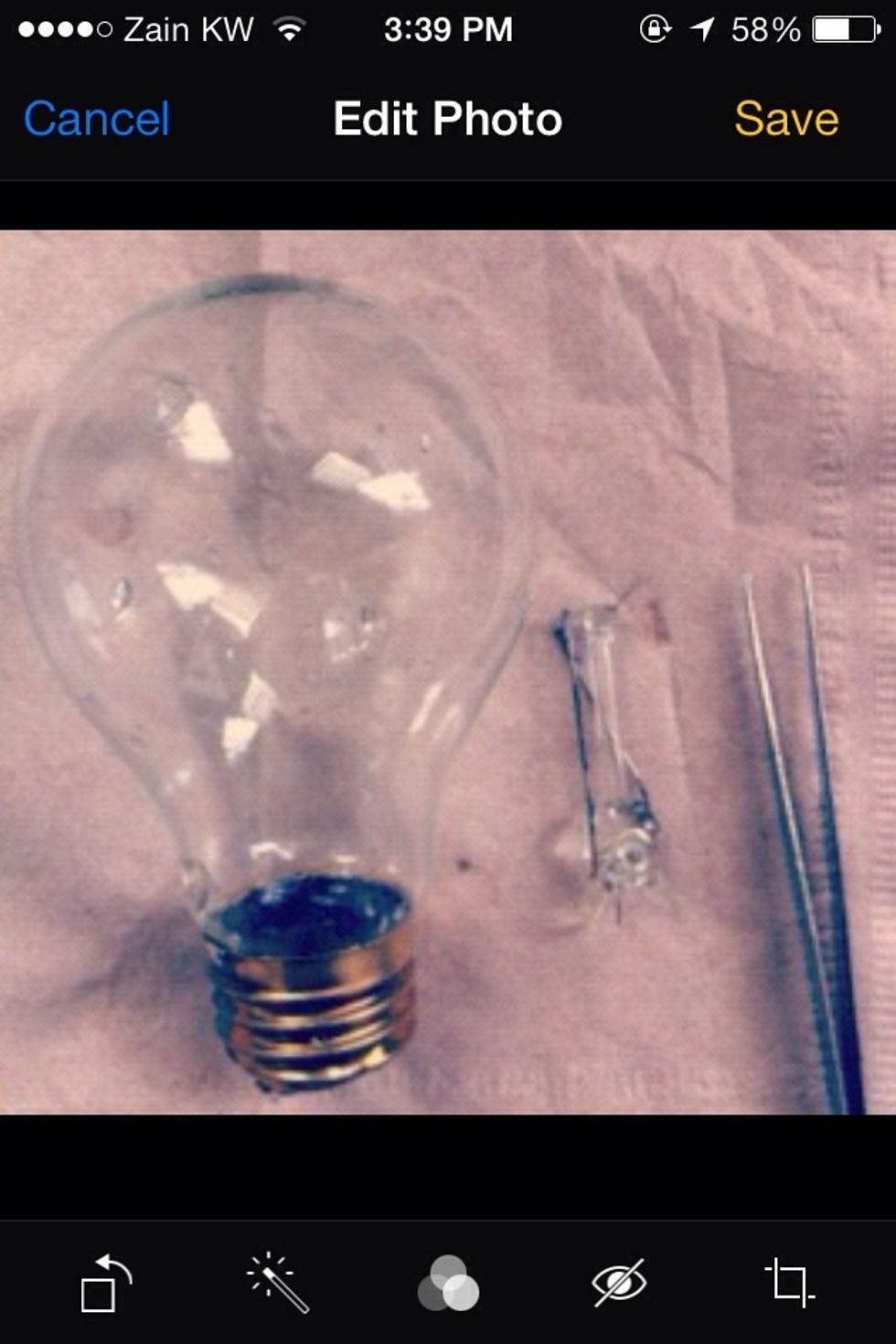 Using your screw driver you will have to break the inner glass part as shown in the image. Then remove it from the light bulb. After that wash the light bulb and dry it with tissue paper.