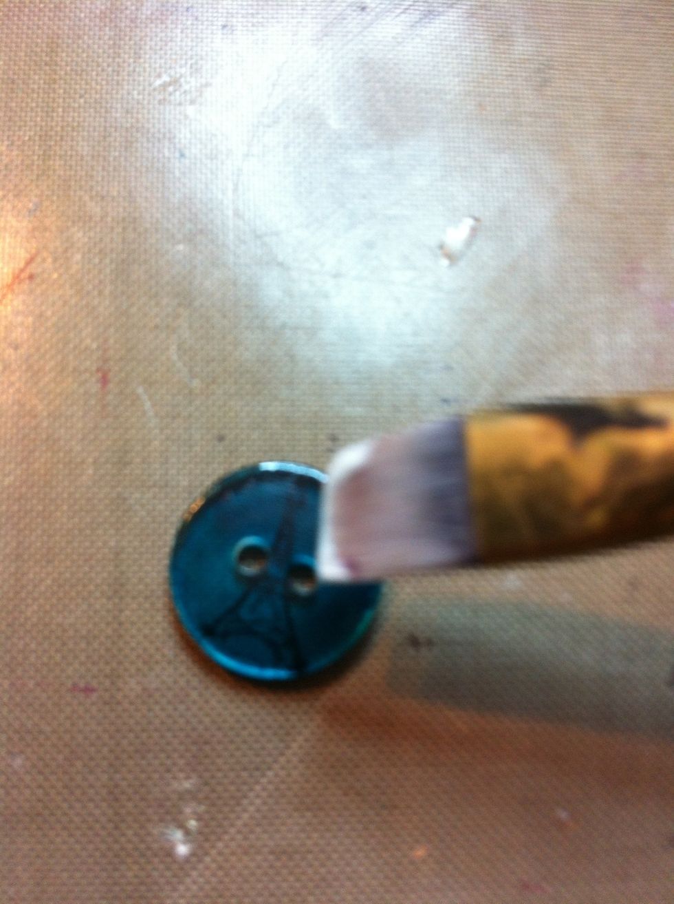 Using your sealer of choice (this is Mod Podge Matte) apply it in single strokes with a paintbrush.