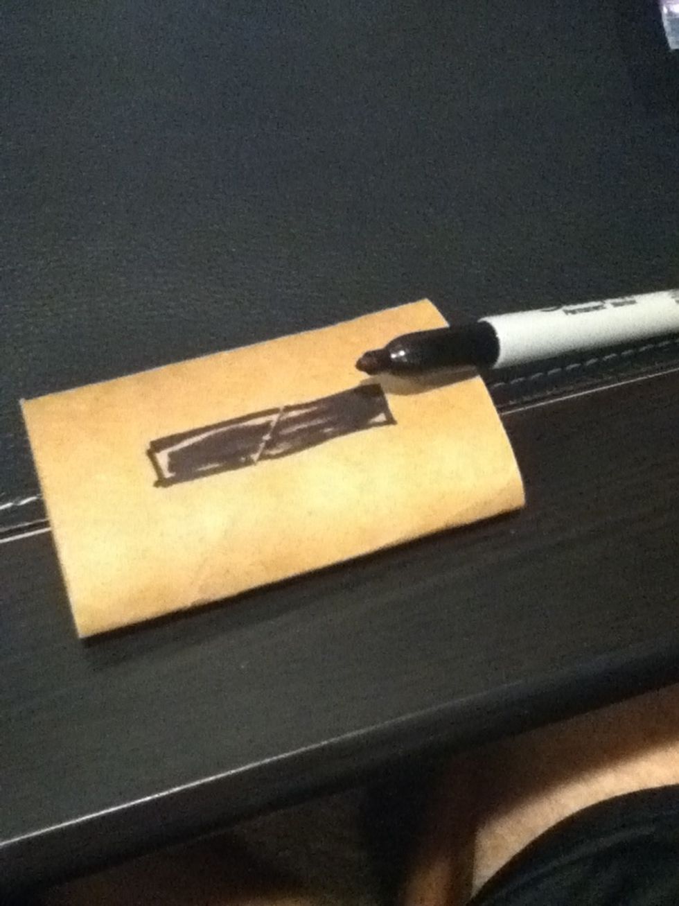 Using your Sharpie, draw a rectangle the same size of your iPod. Make it slightly larger than the base of your iPod.