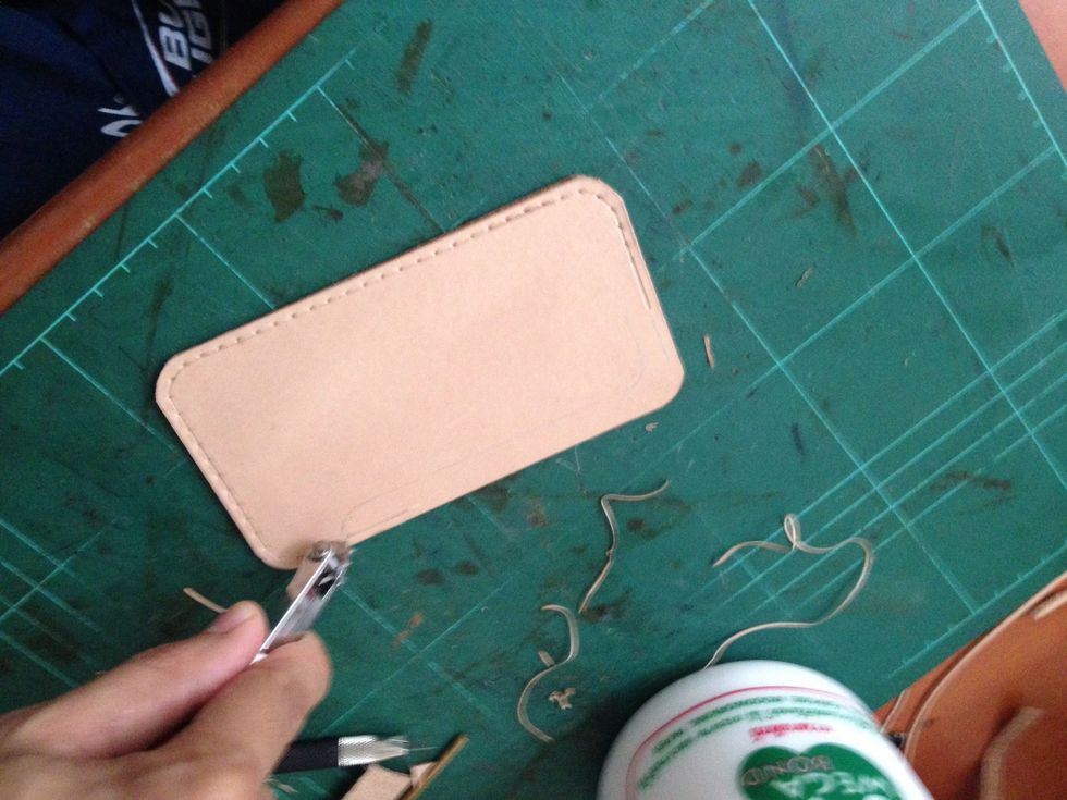 Using your stitching wheel set to 5mm mark the leather