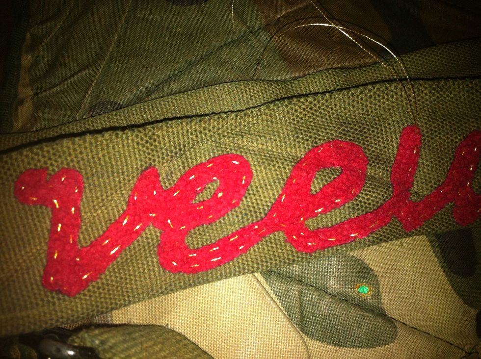 Using your threaded needle, do a running stitch around the border of your entire appliqu\u00e9. Your stitch needn't be exact but do try to make it uniform. Repeat this step once or twice for durability.