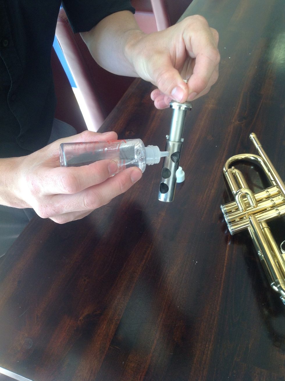 Using your valve oil, oil around the holes with a few drops.
