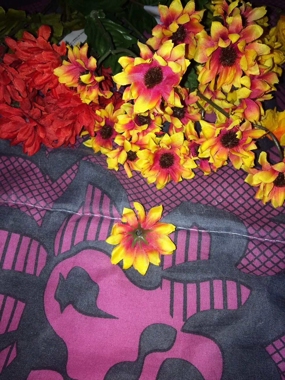 Using your wire cutter, take your flowers and cut them off the boquet leaving no excess.