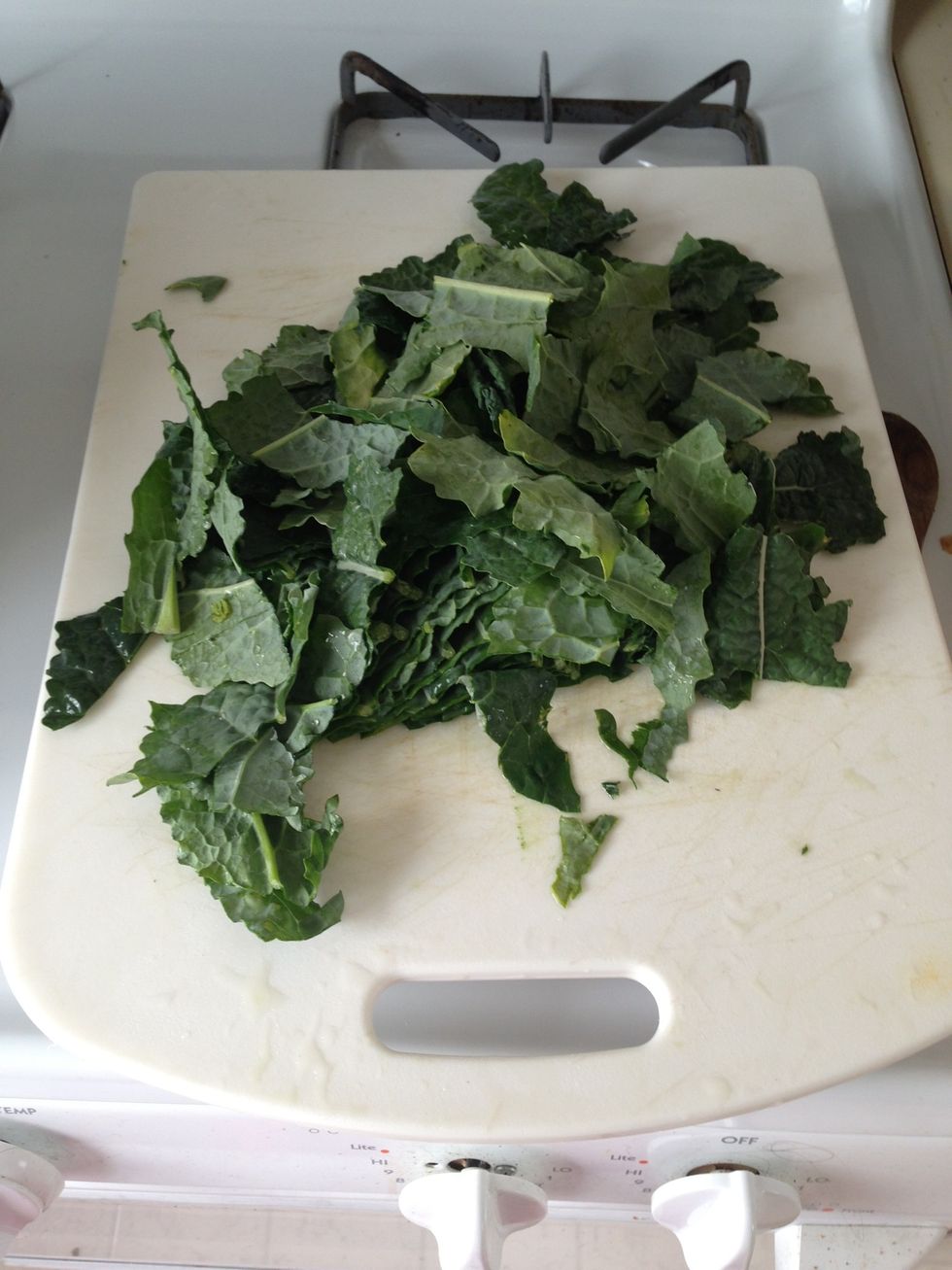 Usually Hoppin John is made with collards, but I like Dino kale, so add that in batches and cook until its bright Godzilla green and slightly wilted.