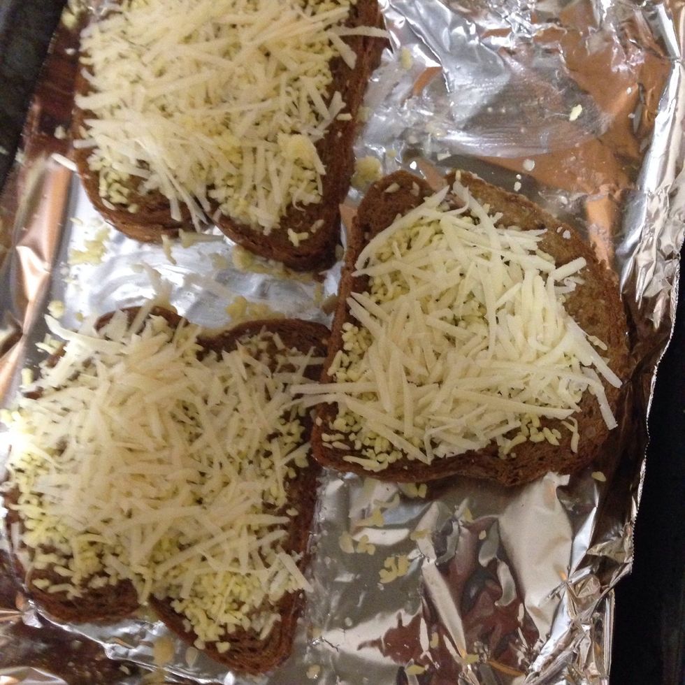 Usually i would just toast it with the garlic but today i also used some cheddar and parmesan. So toast it for about 2 mins in the broiler. Once done cut then lengthwise.