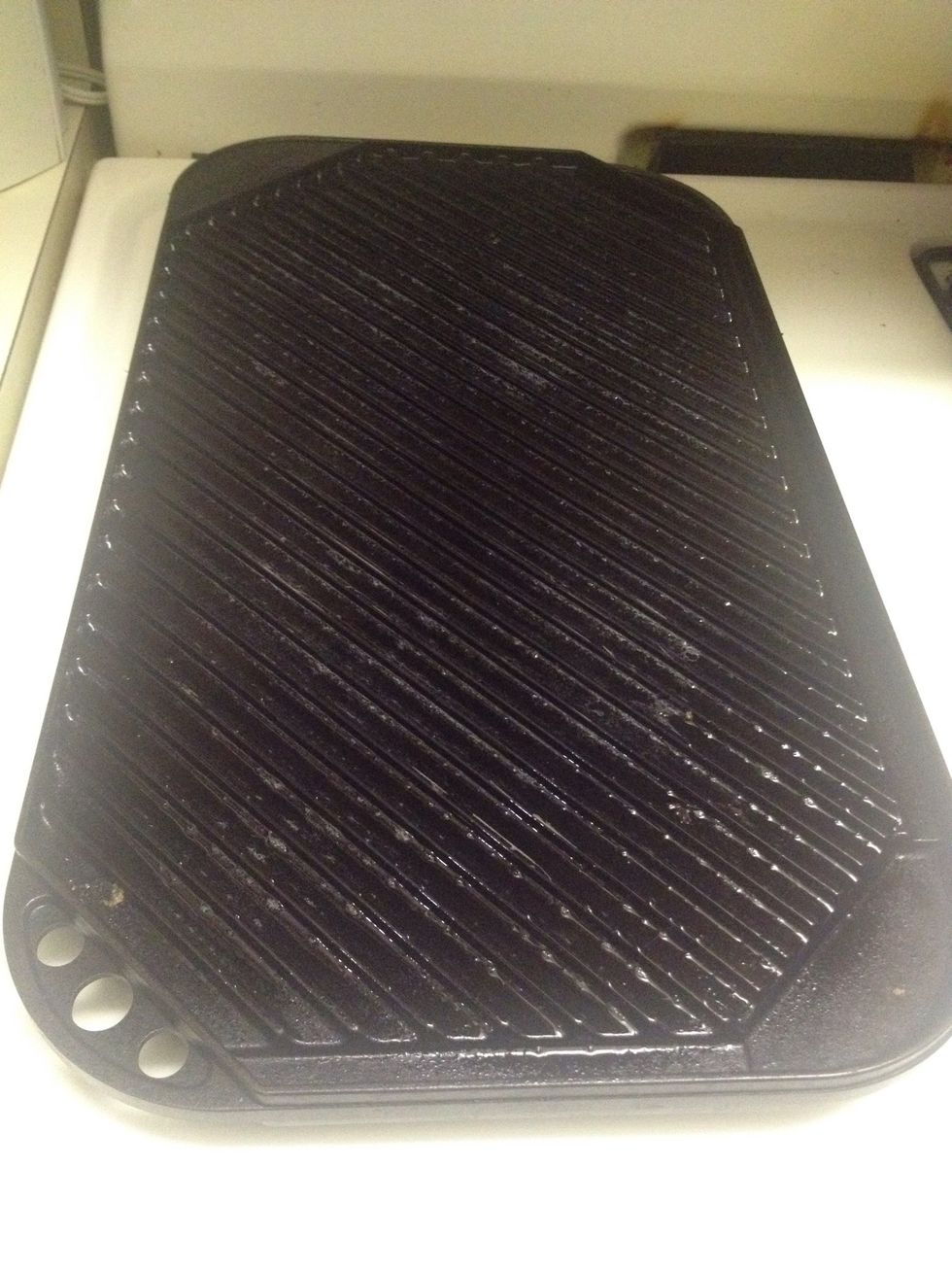 Usually I would make this on the outdoor grill but since it's raining, the indoor grill pan is what I'm using. Make sure you spray It down with nonstick cooking spray.