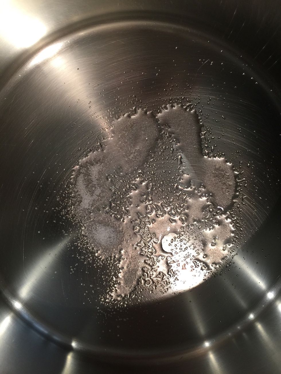 Usually the sugar will start to melt immediately with slight coloring