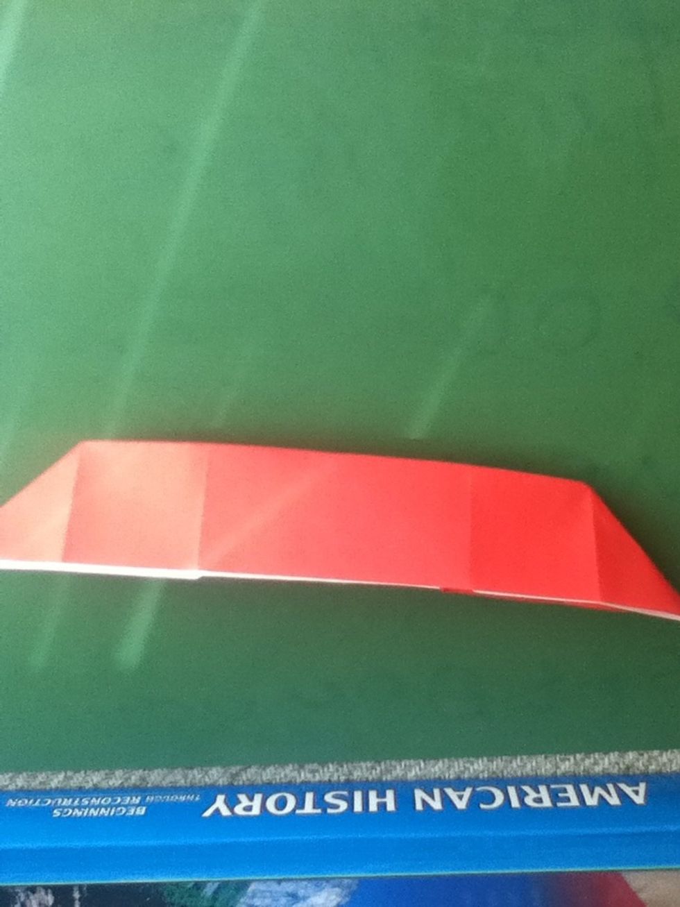 Valley fold the model in half, top to bottom