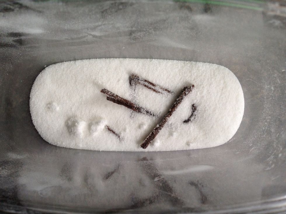 Vanilla sugar! You can keep adding sugar to the beans, they're pretty powerful.