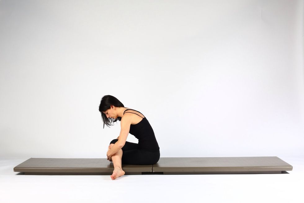 Variation 2. To add more intensity lower chest to knee.