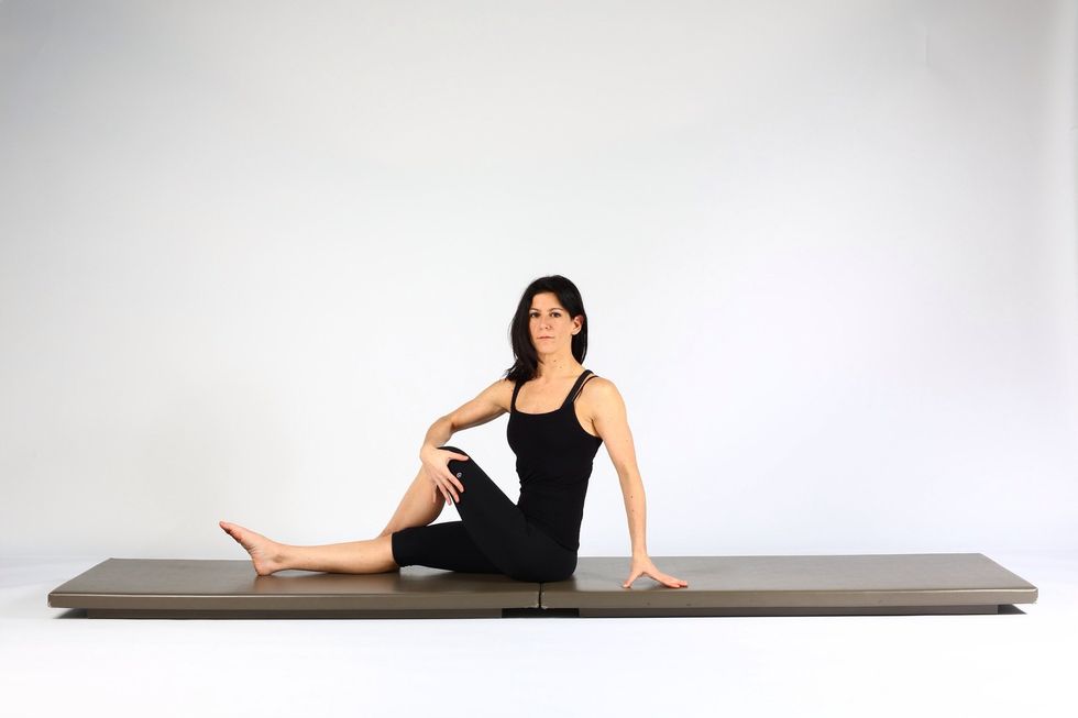 Variation 3. Sit tall and cross left leg over right. Place right hand on left knee pulling it across to the right an in to the body. ( adds a spinal rotation as well).