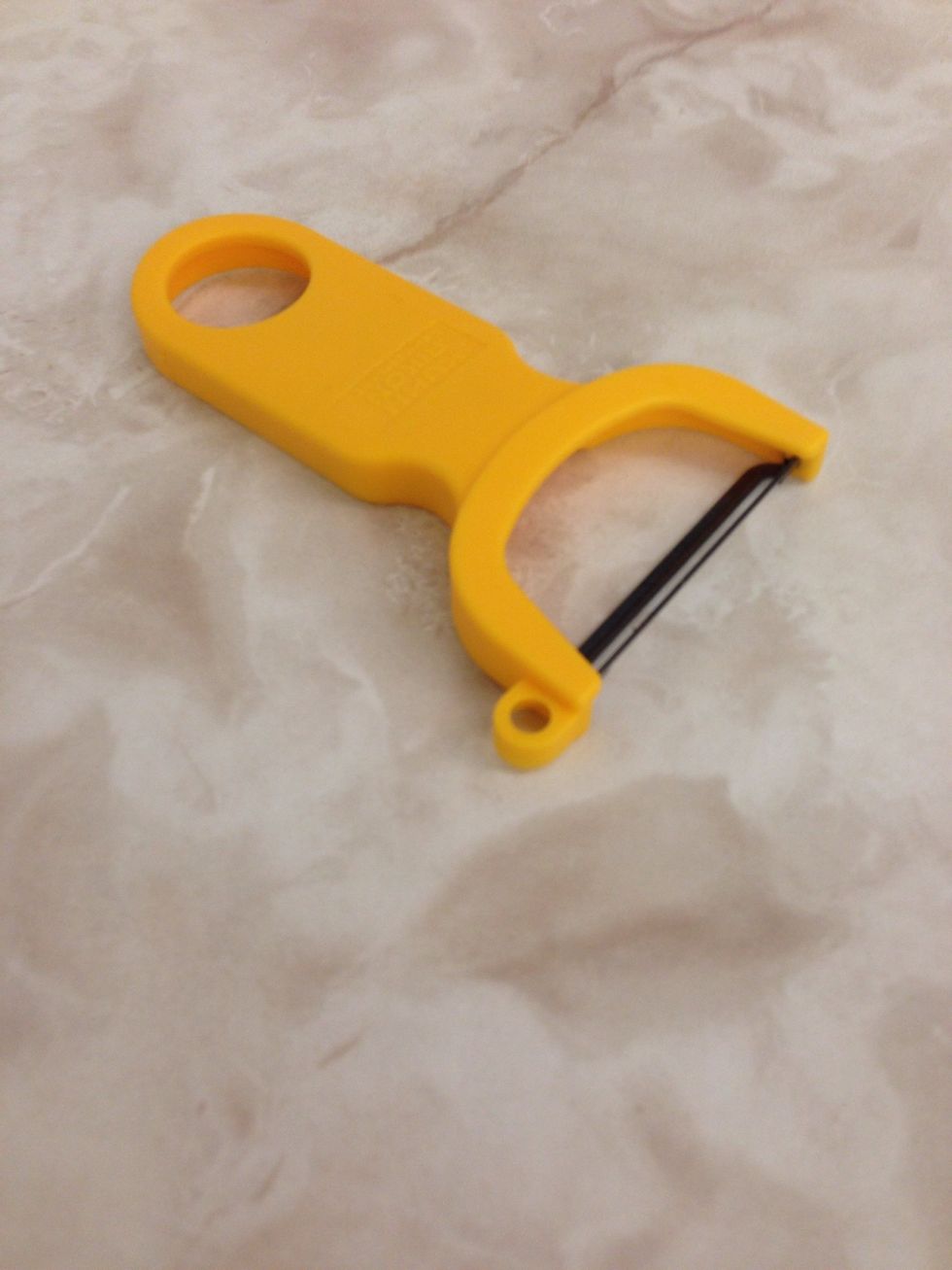 Vegetable peeler this is used to peal vegies I can use this when I peak fruits