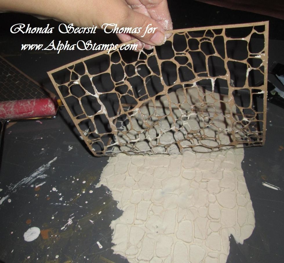 Very, and I mean VERYYYYY gently, pull your stencil up and off of the Paperclay.