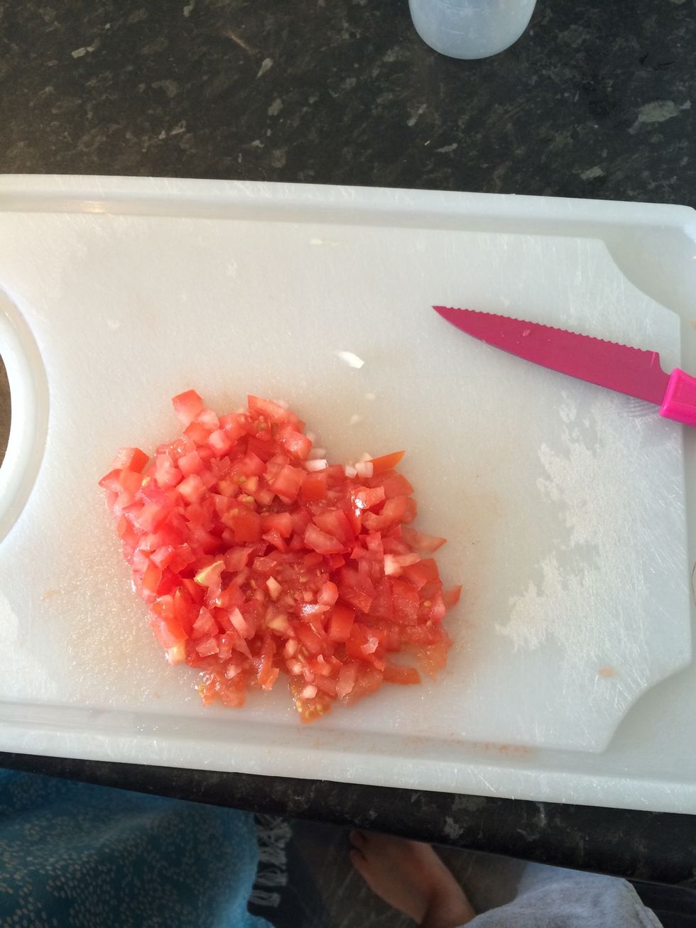 Very finely chop the onion and tomato