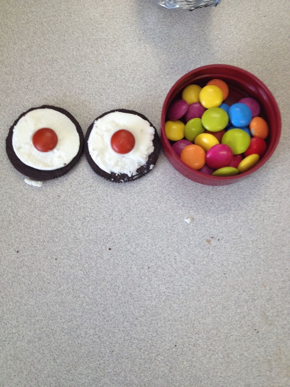 Very gentle press MnM into the biscuit