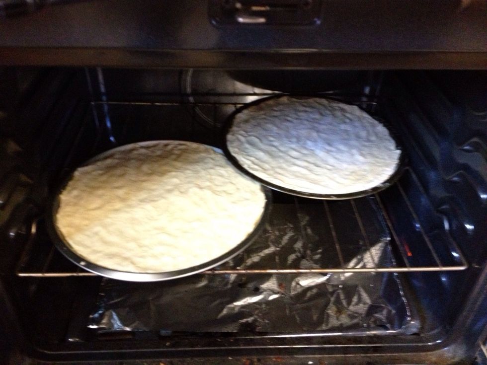 Very important! Spray pizza pans. Spread out dough and place in oven for 8 to 10 minutes. Cool for 5 minutes. Loosen the crust from pan before putting ingredients on crust.