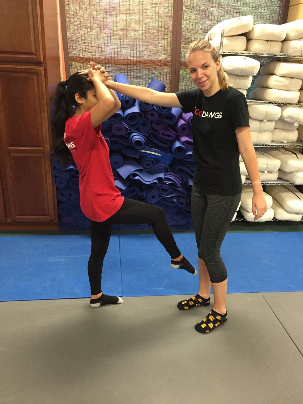 Victim performs a shin kick to disable assailant.