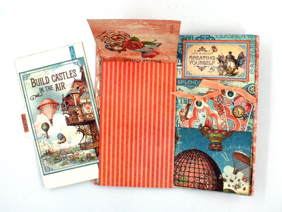 View with flap opened and file folder showing out of the pocket.