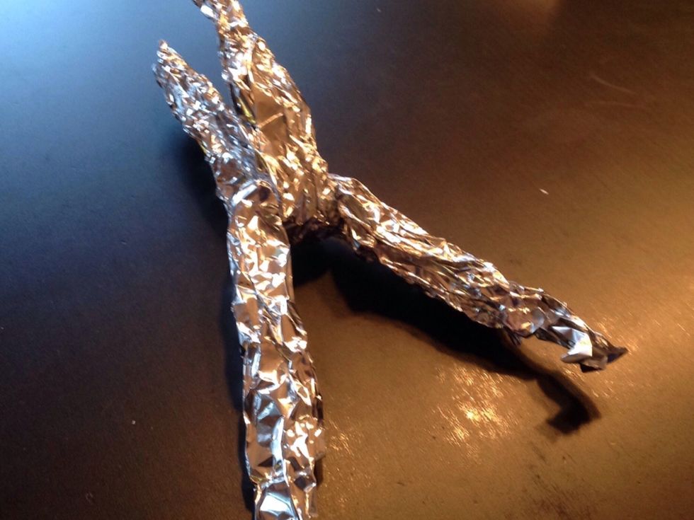 Vik de b\u00e5da delarna till tv\u00e5 V och s\u00e4tt ihop dem.