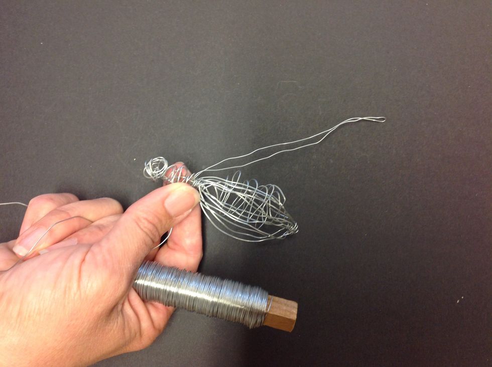 Vik den dubbelt och vira ett varv runt kroppen.