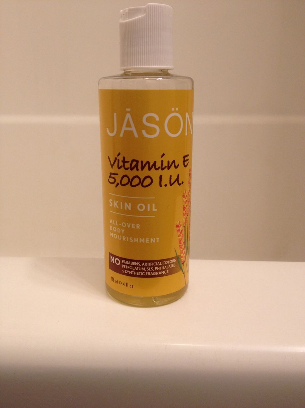 Vitamin E oil helps skin retain moisture and keeps it nice and soft