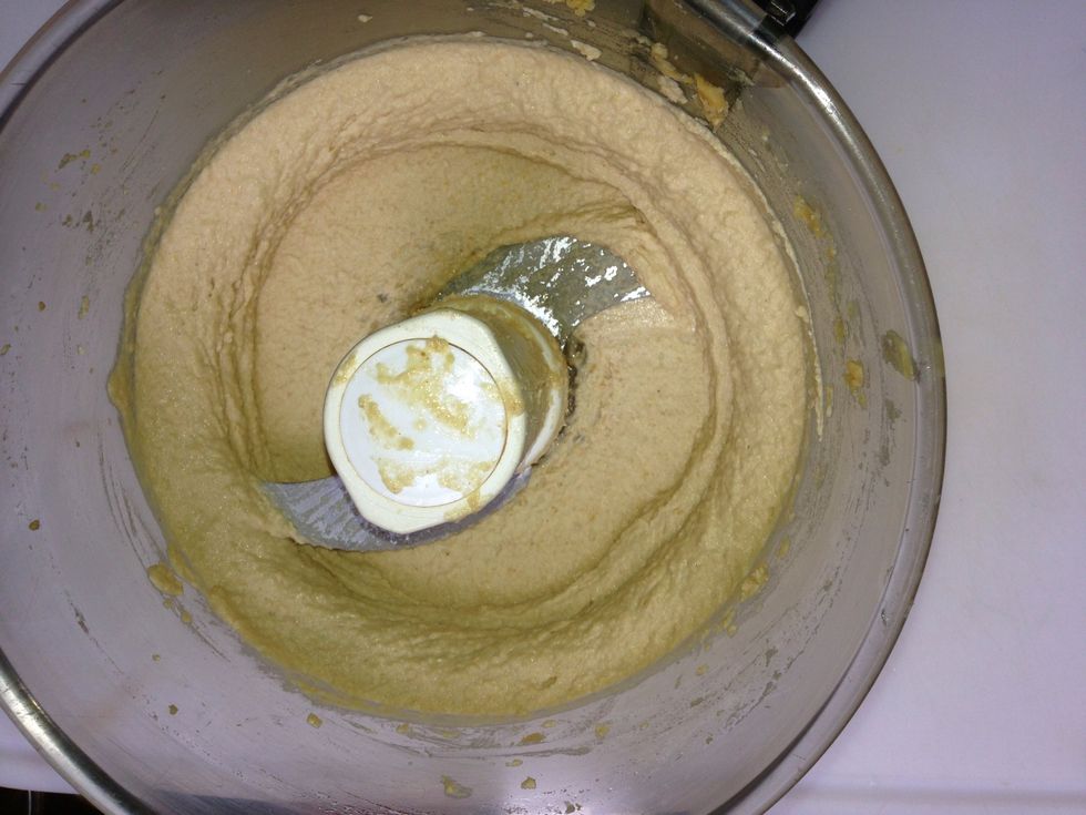 Voila hummus is ready. At this point, if you wish to put the garlic, transfer the  hummus in a recipient mix in the garlic and refrigerate untill you want to serve it.n