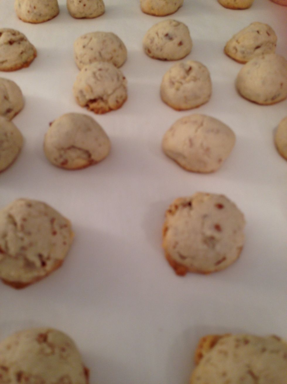 Voila! Let these cool on the counter. Then, pour a bunch of powdered sugar into a big bowl.