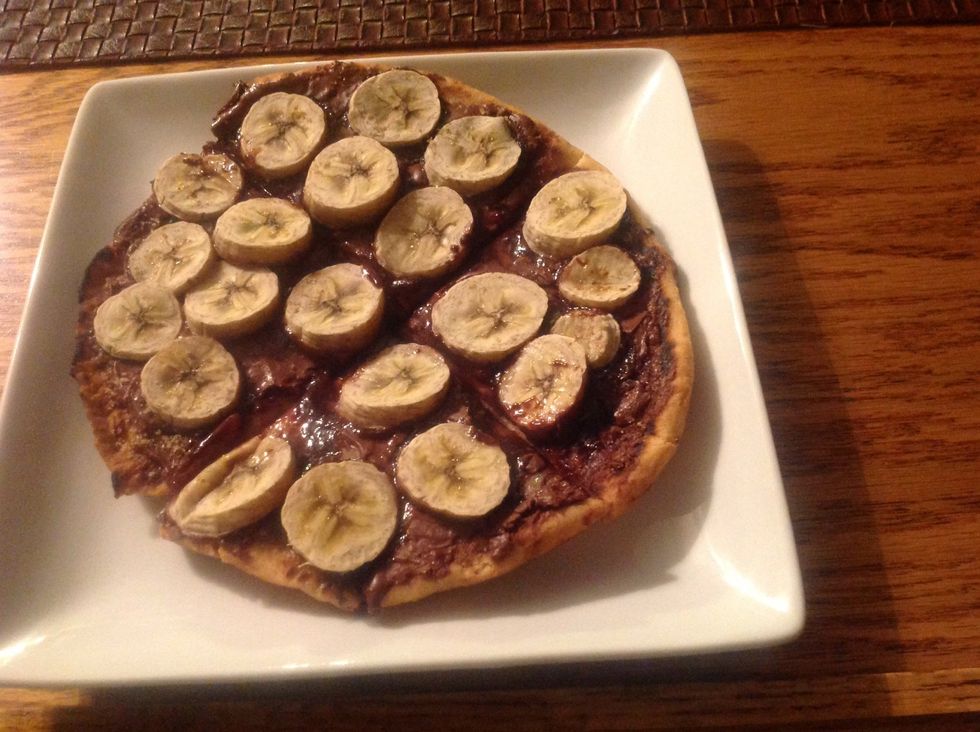 Voila! One of the easiest and most delicious treats. I sprinkled mine with brown sugar but you can add whip cream, ice cream, or just enjoy the deliciousness of Nutella by itself.