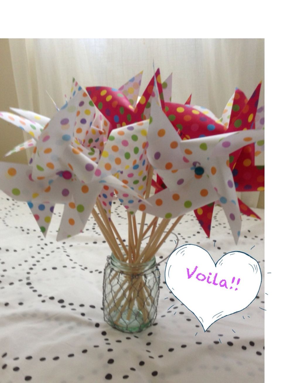 Voila!! Repeat all the following steps until you make your desired number of pinwheels. You should end up with a sweet bouquet of pinwheels for your next birthday bash or summer bbq!