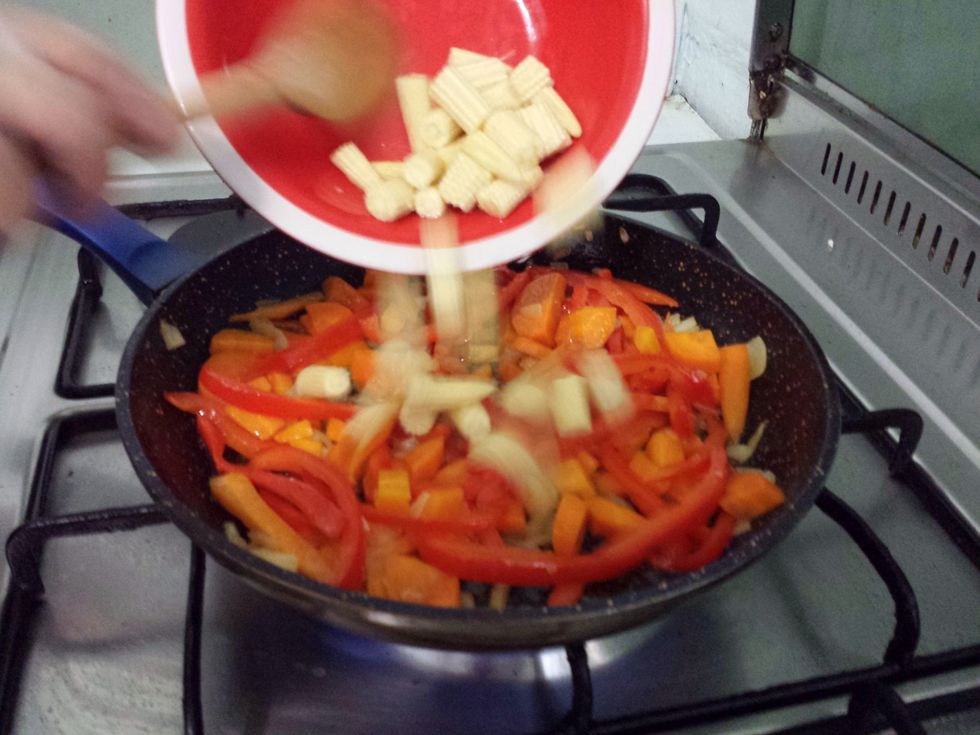 Wait another minute then put in the baby corn.
