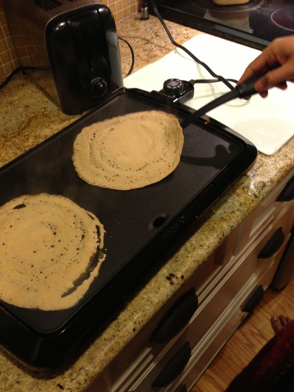 Wait for a min and flip the dosa.