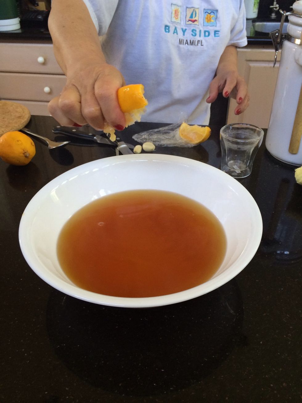 Wait for fish sauce to cool, then squeeze 1/4 lemon