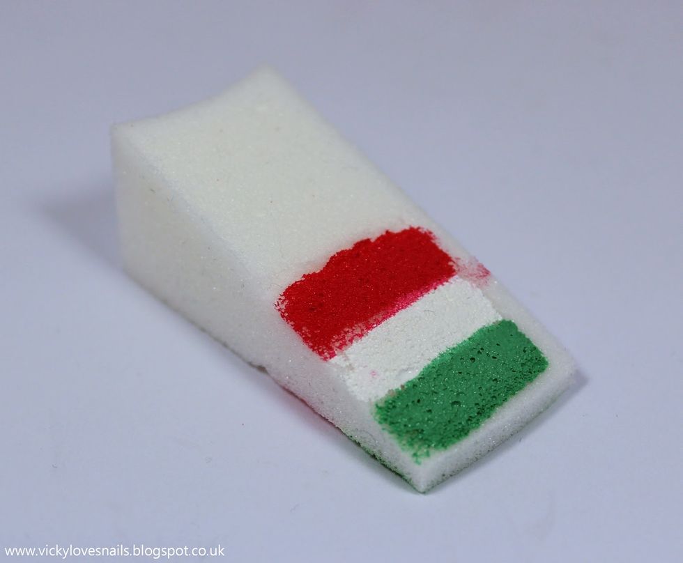 Wait for the white nails to dry. Then put a stripe of red, white and green in the order of the image ( you may need to do a couple of layers. If you don't have red use pink it works well).