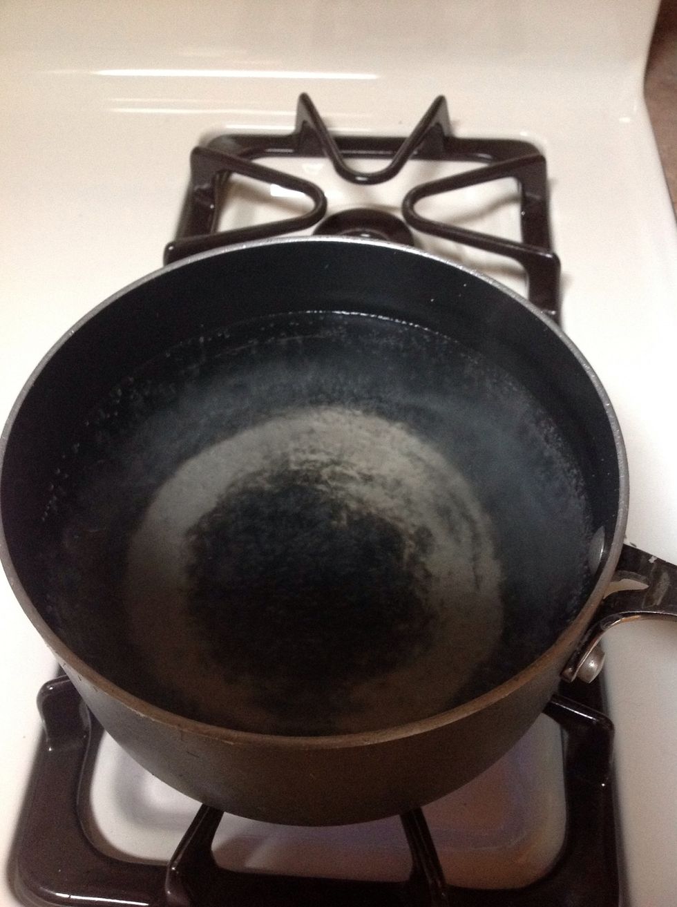 Wait for water to boil.