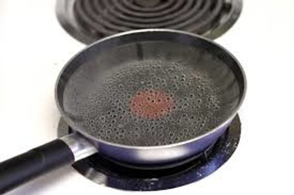 wait for water to simmer (you know if it is simmering if the temperature of the water is 180 degrees or there are slowly rising bubbles)