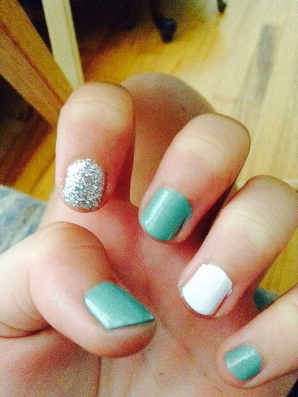 Wait for your nails to dry for at least 10 minutes. Better safe than sorry! Something that might help is putting your wet nails in ice water