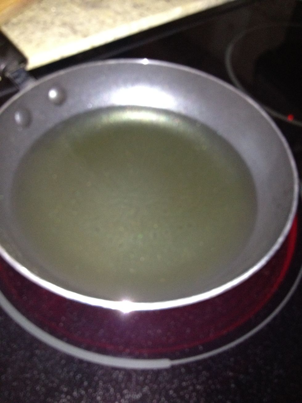 wait for your oil to heat up. if your oil doesnt sizzle(that's when you know it's hot) then get a little water on you finger and let it drip into the oil, if it sizzles and spazes then it's hot haha;)