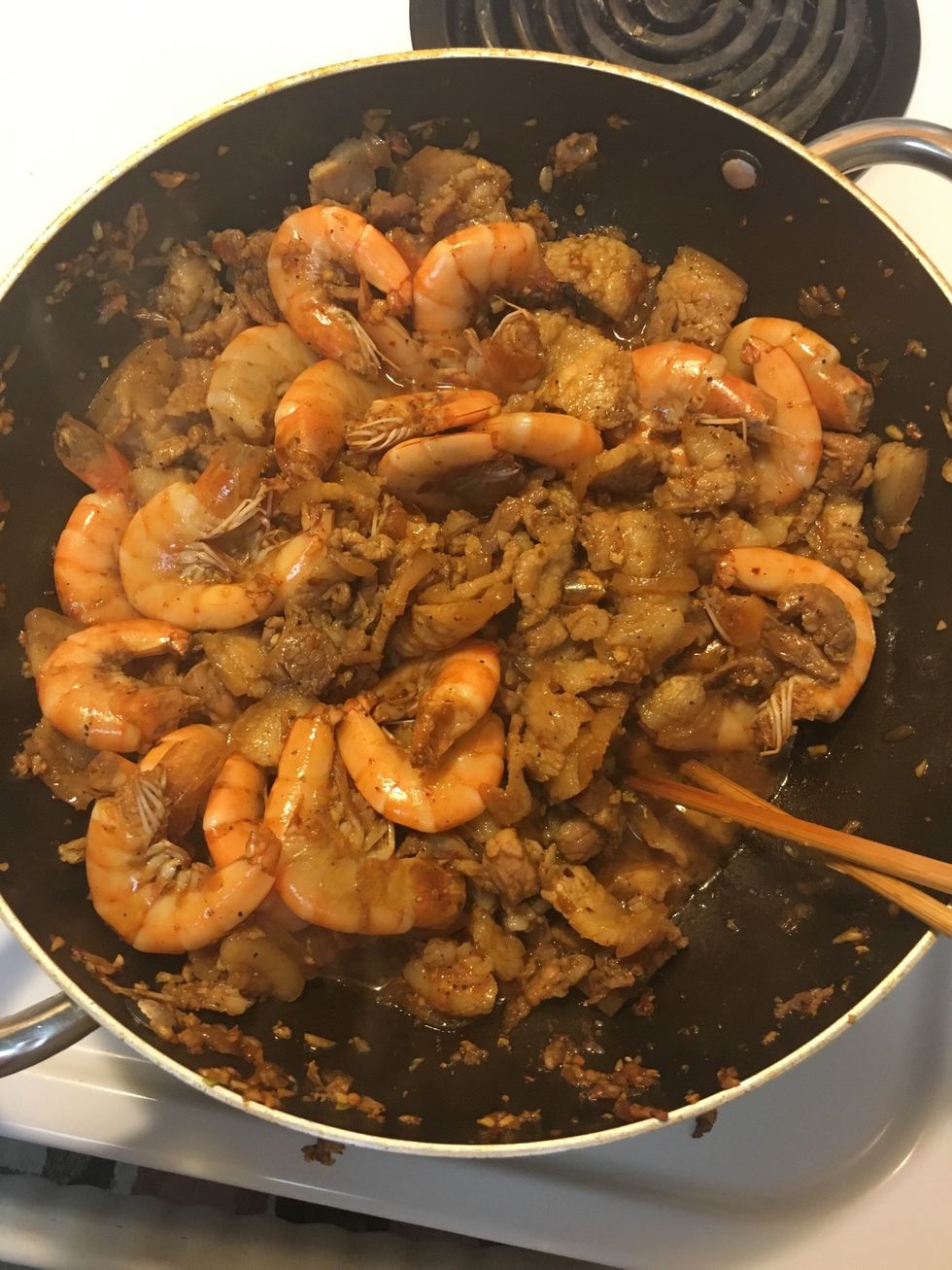 Wait till shrimps and meat are cooked