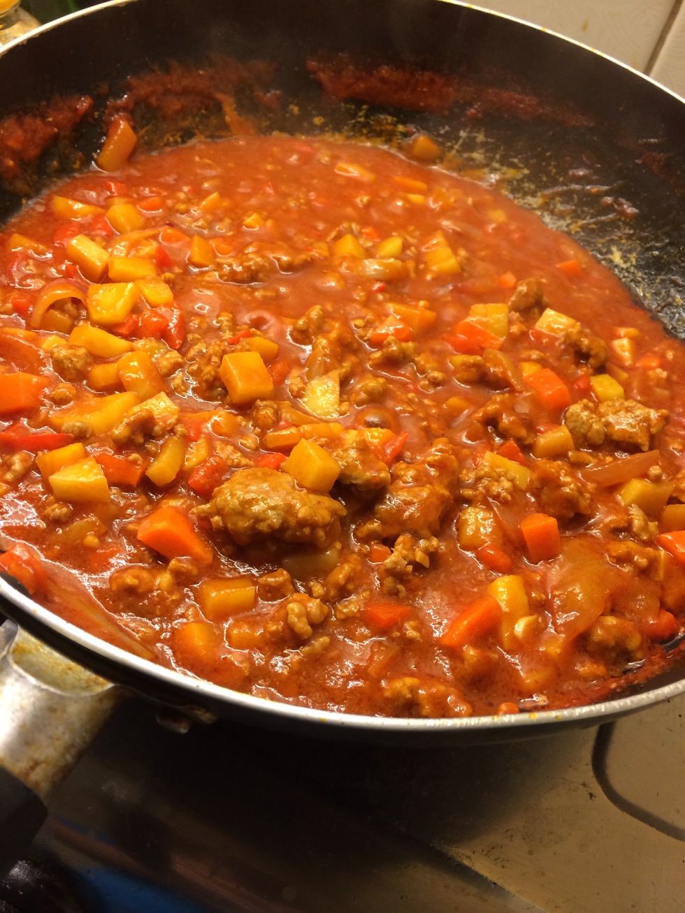 Wait till the potatoes are soft and ready to serve if it's a bit sour due to the lime and tomato paste add cheese or sugar.