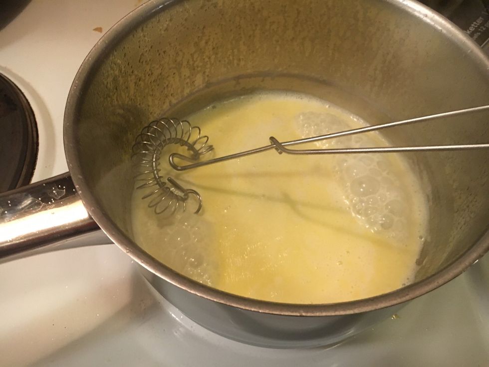 Wait until it boils. Then remove the pot from the heat...