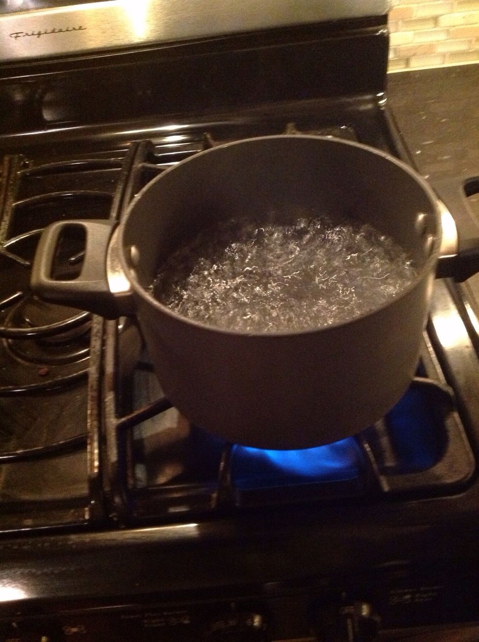 Wait until the water is boiling.