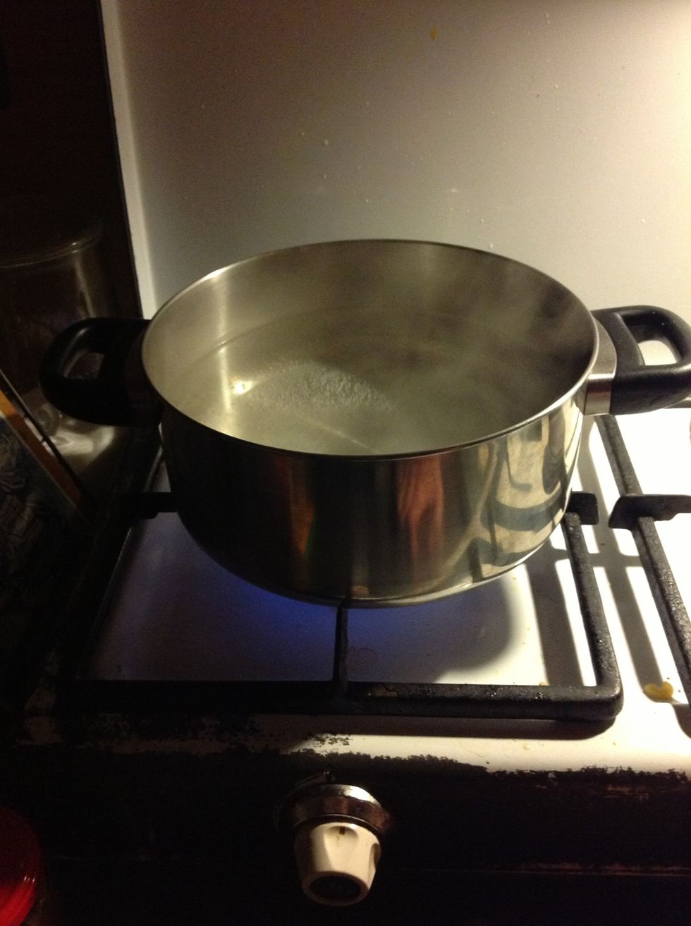 Waiting until the water is boiling.... Add some salt at the end (water boils slower when you add salt from the start)