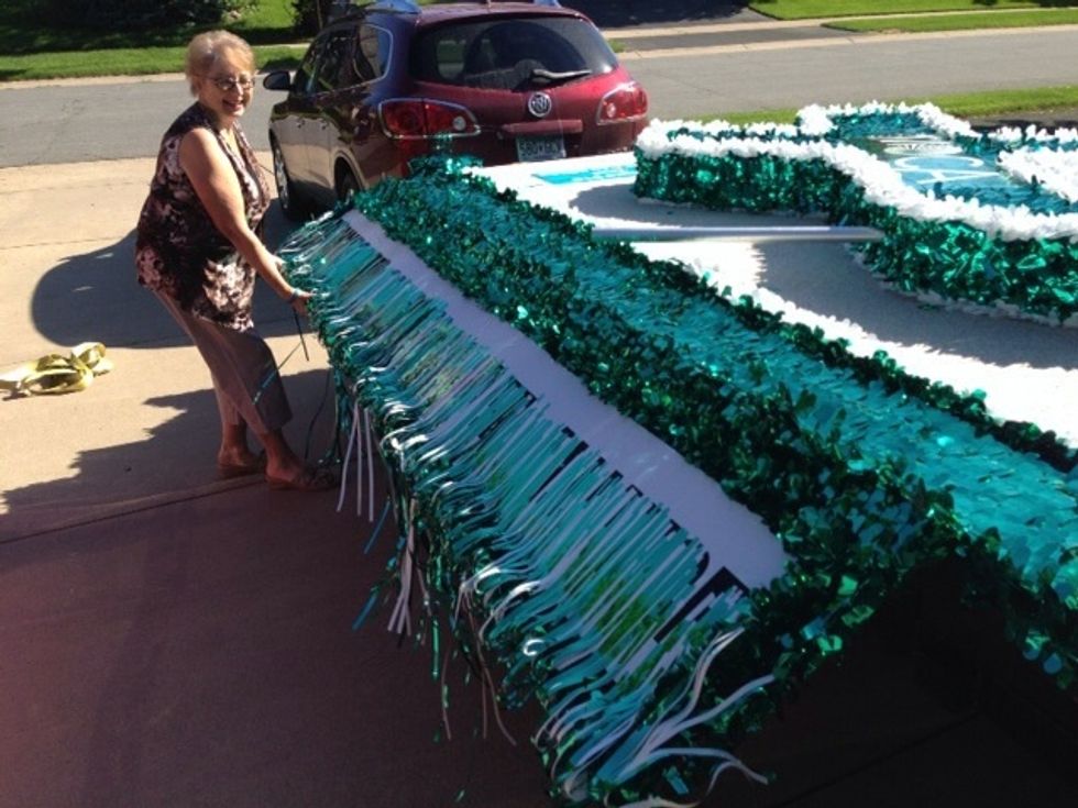 Walk around the float and carefully flip down each side.