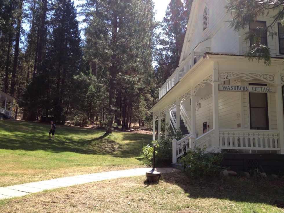 Walk up the hill behind the main building, between the cottages..