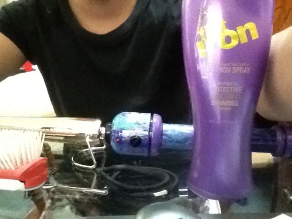 Wand; brush; heat protecter (optional); hair tie and clips/ bobby pins (you don't need but they can be helpful)