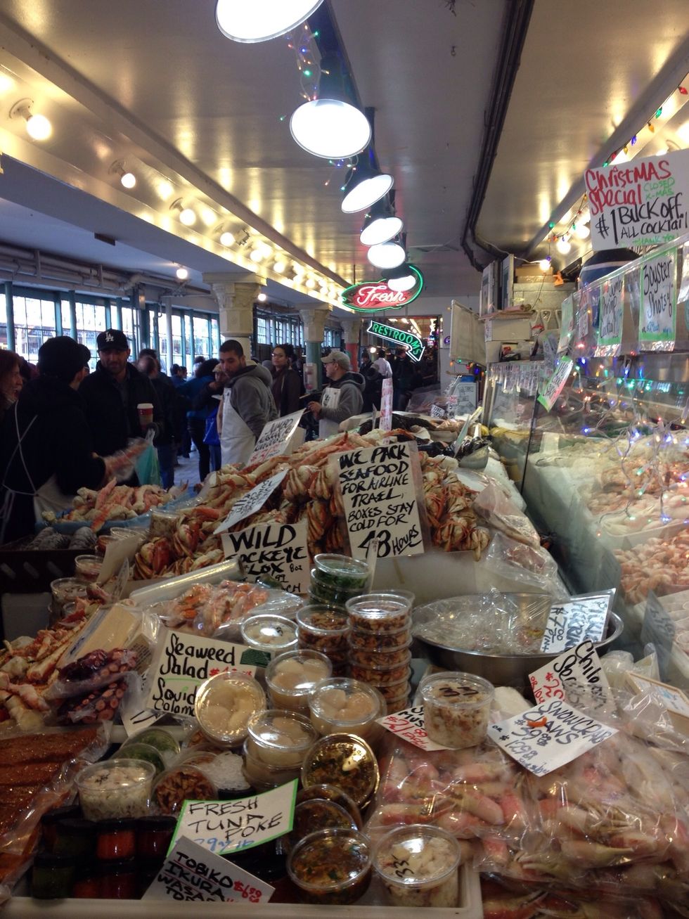 Wander through the market until you find (or smell) the seafood.
