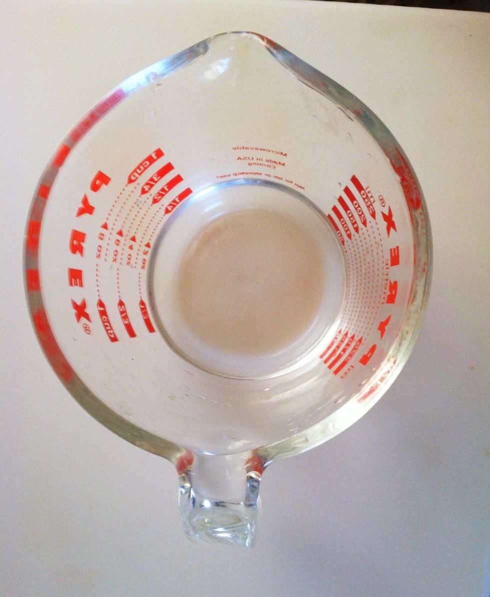 Warm 1/4 cup of water. It cannot be too hot or the yeast will die. Too cold and it won't revive. Water should be warm to the touch, 100-110 degrees