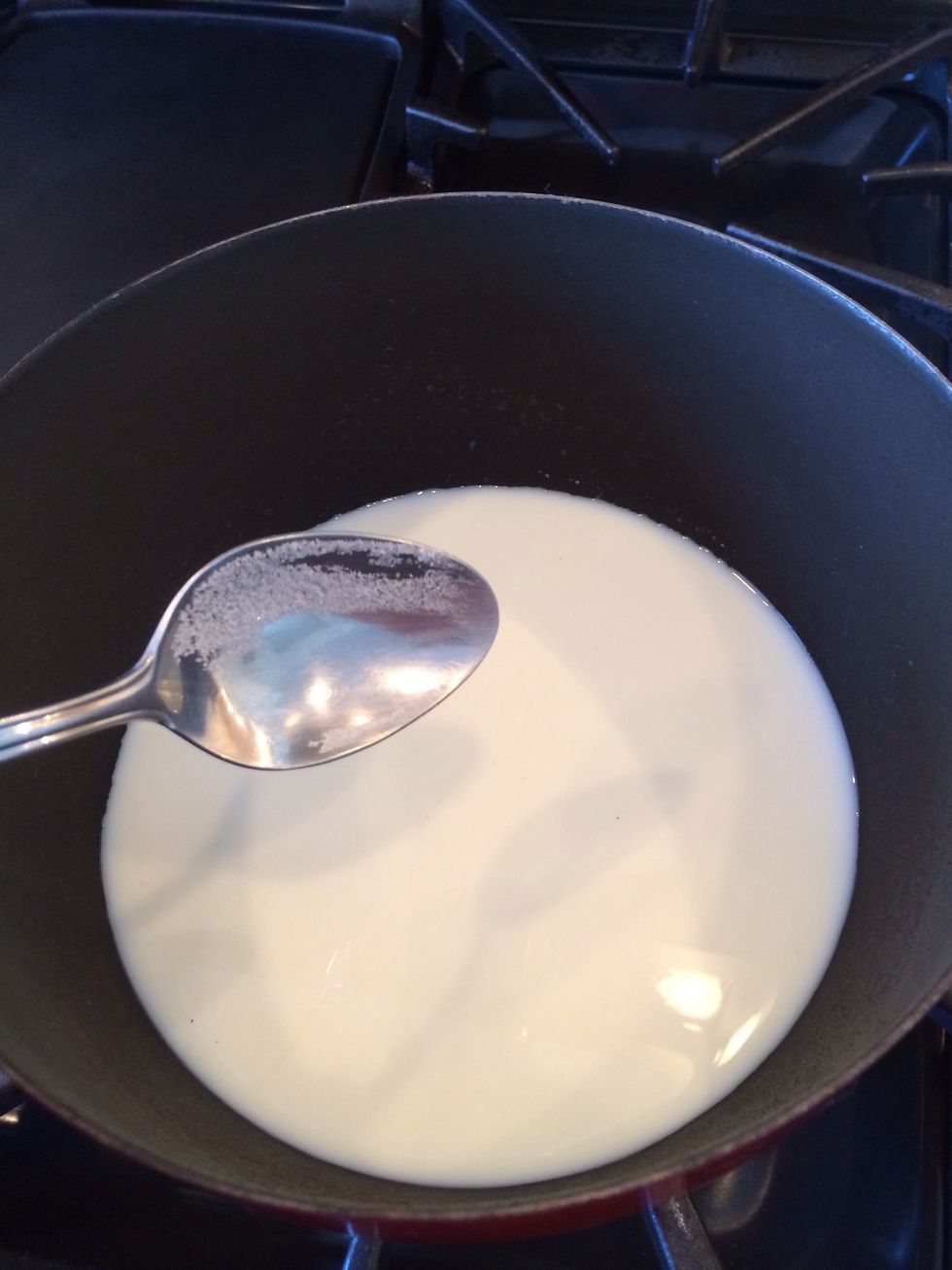 Warm  1 cup of milk to about 120 deg.   Add 4 tablespoons of sugar.