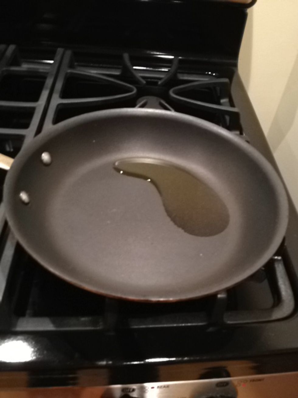 Warm a non-stick skillet over medium high heat. Once warm, add 2 teaspoons of olive oil