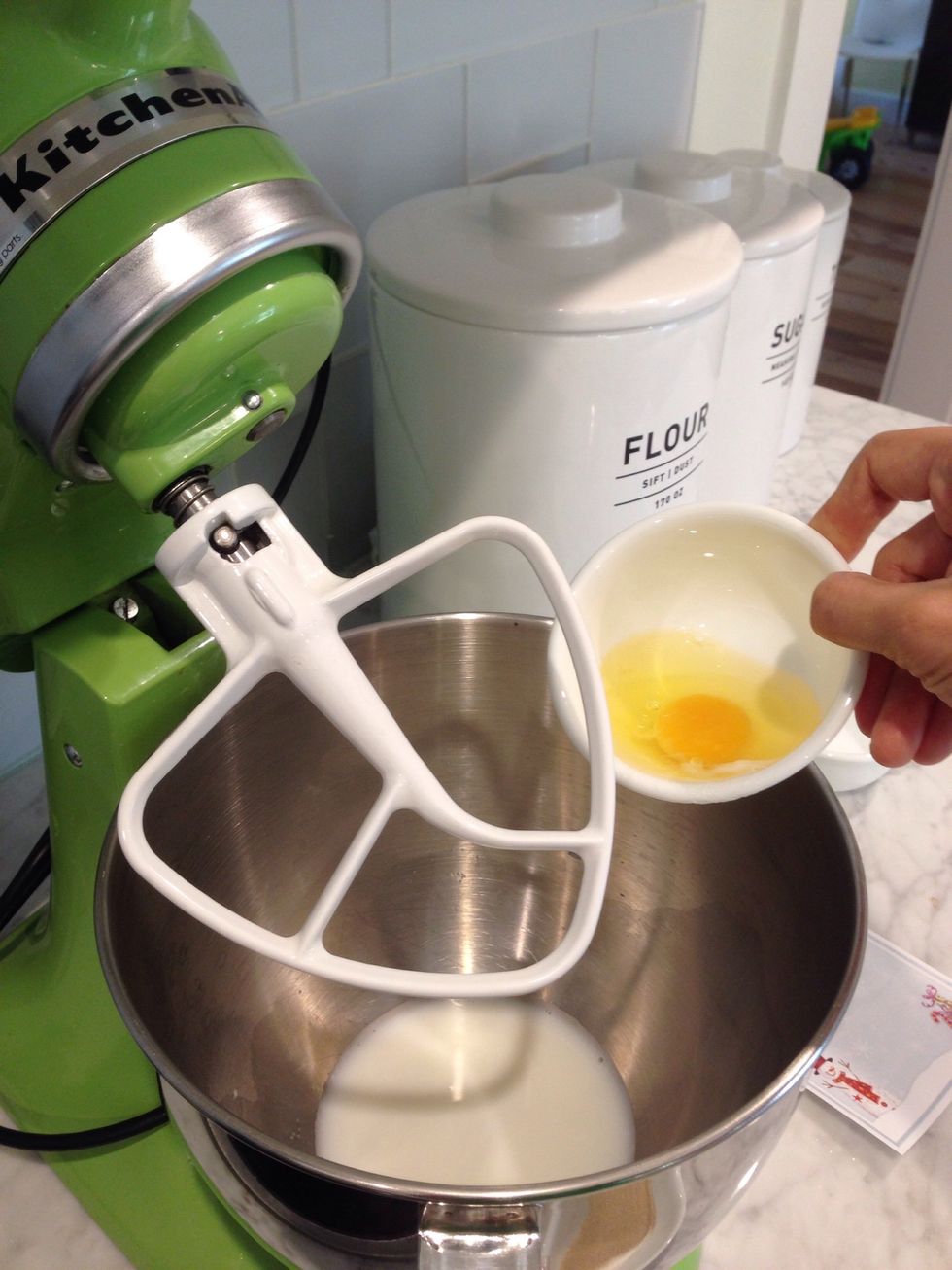 Warm milk , water, egg